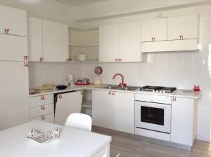 Η κουζίνα ή μικρή κουζίνα στο Appartamento Balù +9 φωτογραφίες