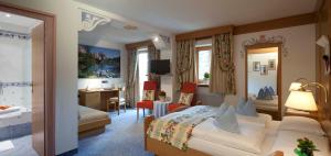 Voodi või voodid majutusasutuse Hotel Al Sonnenhof toas