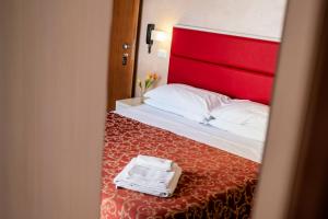 Postel nebo postele na pokoji v ubytování Hotel Belmar