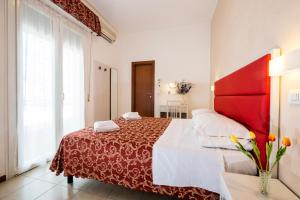 Postel nebo postele na pokoji v ubytování Hotel Belmar