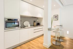 A kitchen or kitchenette at Atocha Museos - Barrio de las Letras