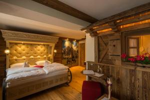 Postel nebo postele na pokoji v ubytování Hotel Al Sonnenhof