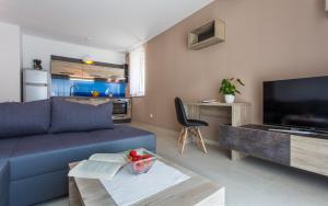 Μια τηλεόραση ή/και κέντρο ψυχαγωγίας στο Apartments Viktorija 2