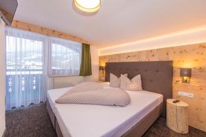 A bed or beds in a room at Vizensn Living