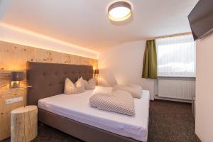 A bed or beds in a room at Vizensn Living