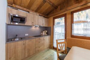 A kitchen or kitchenette at Vizensn Living