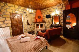 A bed or beds in a room at XENIOS ZEYS (ΞΕΝΙΟΣ ΖΕΥΣ)