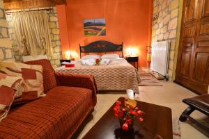 A bed or beds in a room at XENIOS ZEYS (ΞΕΝΙΟΣ ΖΕΥΣ)