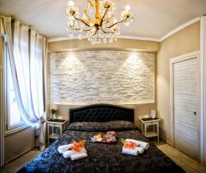 Кровать или кровати в номере Maison degli Artisti