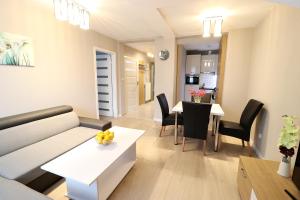 Posedenie v ubytovaní Apartamenty BM'Kruk