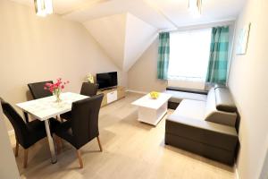 Posedenie v ubytovaní Apartamenty BM'Kruk