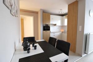 Kuchyňa alebo kuchynka v ubytovaní Apartamenty BM'Kruk