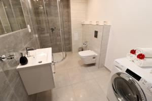 Kúpeľňa v ubytovaní Apartamenty BM'Kruk + 37 fotografií