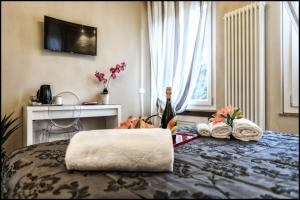 Кровать или кровати в номере Maison degli Artisti