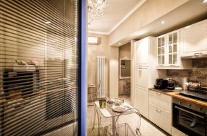 Кухня или мини-кухня в Maison degli Artisti
