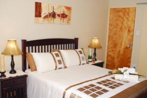 Cama o camas de una habitación en Cycas Guest House