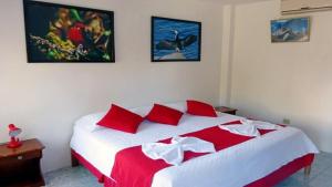 Voodi või voodid majutusasutuse Hostal Sandrita toas