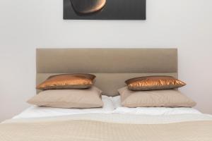 Posteľ alebo postele v izbe v ubytovaní Grace Apartment I