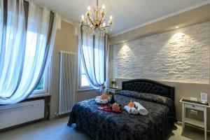 Кровать или кровати в номере Maison degli Artisti