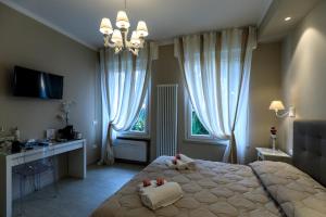 Кровать или кровати в номере Maison degli Artisti
