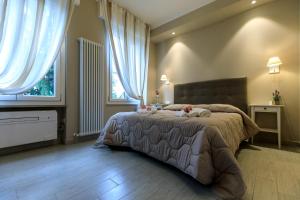 Кровать или кровати в номере Maison degli Artisti