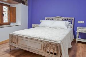 Postel nebo postele na pokoji v ubytování Apartamentos Casa Ramoncín + 3 fotografie