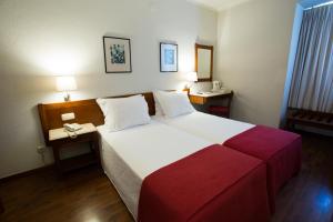 Postel nebo postele na pokoji v ubytování Hotel Solaris + 37 fotografií