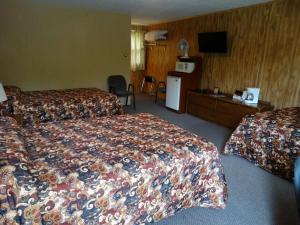 Tempat tidur dalam kamar di Buckhorn Resort