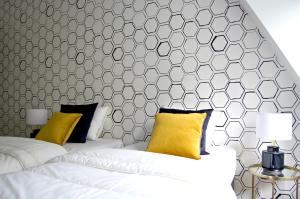 Cama ou camas em um quarto em ApartHostel Warszawa