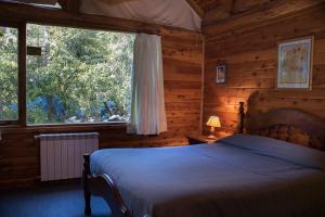 Postel nebo postele na pokoji v ubytování Patagonia Sin Fronteras
