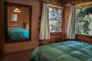 Postel nebo postele na pokoji v ubytování Patagonia Sin Fronteras