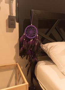 Dreamcatcher Bangkok客房内的一张或多张床位