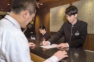 Os funcionários de Nathan Hotel