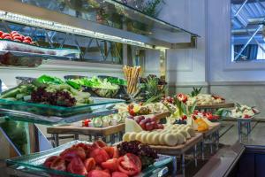 a buffet line with many different types of food at Elite World Istanbul Florya in Istanbul