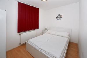 Posteľ alebo postele v izbe v ubytovaní iHome Apartment 3.0
