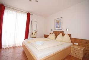 Posteľ alebo postele v izbe v ubytovaní Appartement Annabella