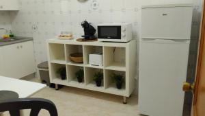Kuchyňa alebo kuchynka v ubytovaní Margall Home