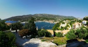 a view of a body of water with trees and houses at Villa Polyxeni in Syvota