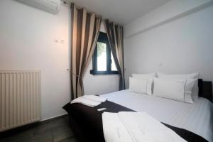 Cama o camas de una habitación en Gazi Boutique Apartment 2