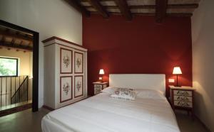 Postel nebo postele na pokoji v ubytování Agriturismo Segnavento