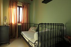 Postel nebo postele na pokoji v ubytování Agriturismo Segnavento