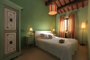 Postel nebo postele na pokoji v ubytování Agriturismo Segnavento