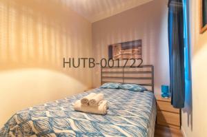 Posteľ alebo postele v izbe v ubytovaní Go-BCN Residence Sagrada Familia