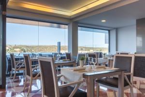 Restoran või mõni muu söögikoht majutusasutuses Barceló Hamilton Menorca - Adults Only