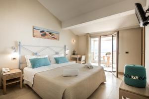 Voodi või voodid majutusasutuse Hotel Mar & Sol toas