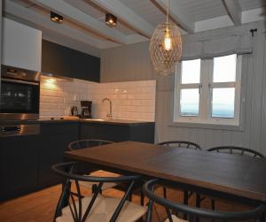 Dapur atau dapur kecil di Bleik Sea Cabins +15 gambar