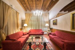 Posezení v ubytování HG Abetone e Piramidi Resort