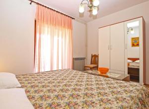 Posteľ alebo postele v izbe v ubytovaní Apartmensts Nikola 1023