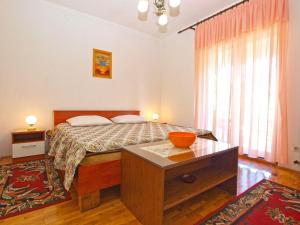 Posteľ alebo postele v izbe v ubytovaní Apartmensts Nikola 1023