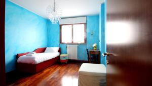 ミラノにあるItalianway-Rucellaiの青い部屋(ベッド1台、窓付)